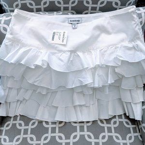 NWT Bebe white multi ruffle mini skirt size medium